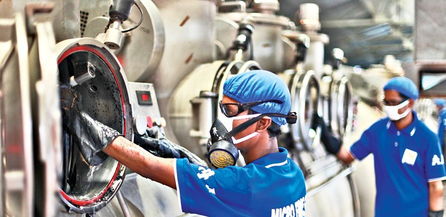Industrial workers in a manufacturing facility